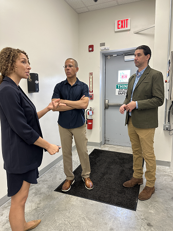 Owner Talking to customer in lab